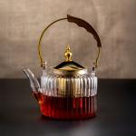 Luxury Glass Teapot with Gold Accents and Wooden Handle