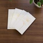 legant White Envelopes with Golden Floral Design