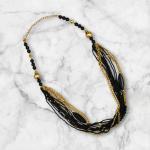 Multi-Strand Beaded Statement Necklace with Black and Gold Accents